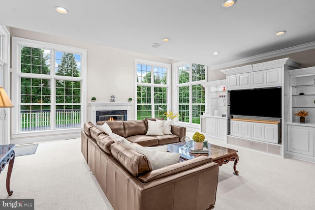 501 Van Lears Run, Villanova, PA 19085 - living room with light colored carpet, recessed lighting, plenty of natural light, ornamental molding, and a high end fireplace
