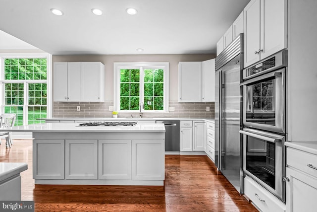 501 Van Lears Run, Villanova, PA 19085 - kitchen featuring stainless steel appliances, light countertops, tasteful backsplash, white cabinets, and recessed lighting