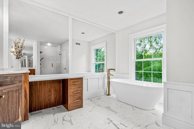 501 Van Lears Run, Villanova, PA 19085 - bathroom with vanity, a shower stall, wainscoting, marble finish floors, and a soaking tub