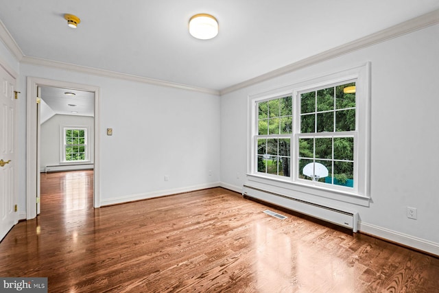 501 Van Lears Run, Villanova, PA 19085 - empty room with baseboard heating, crown molding, wood finished floors, and a smoke detector
