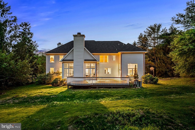 501 Van Lears Run, Villanova, PA 19085 - rear view of house featuring a yard, a wooden deck, and a chimney