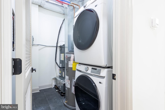 3116 Clifford St Unit 2, Philadelphia, PA 19121 - laundry area with estacked washer and dryer and water heater