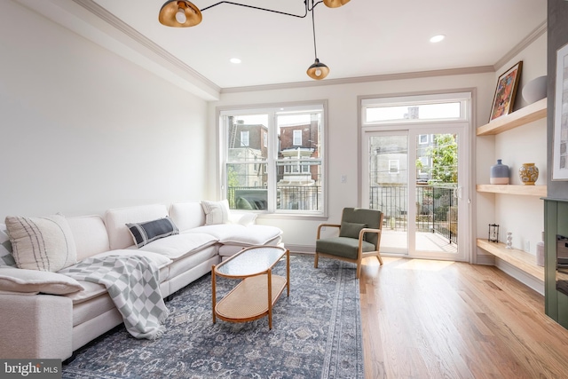 3116 Clifford St Unit 2, Philadelphia, PA 19121 - living area with wood finished floors, ornamental molding, and recessed lighting