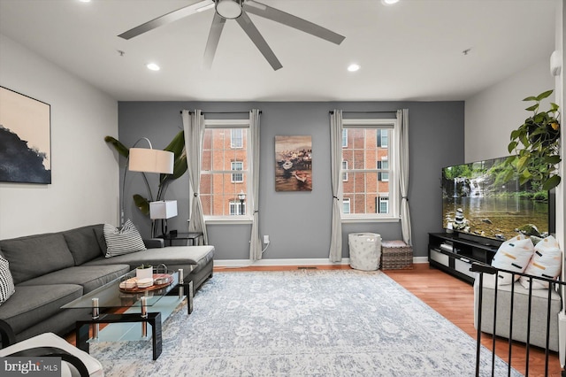 1506 Stack St, Baltimore, MD 21230 - living area with wood finished floors, healthy amount of natural light, ceiling fan, and recessed lighting