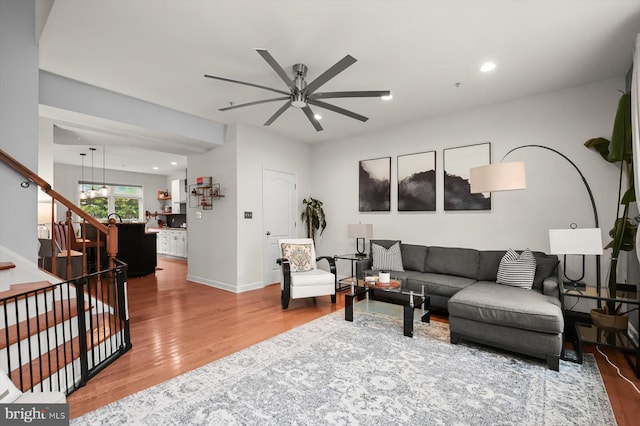 1506 Stack St, Baltimore, MD 21230 - living area with a ceiling fan, wood finished floors, and stairs