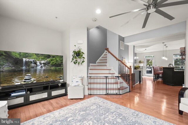 1506 Stack St, Baltimore, MD 21230 - living area with wood finished floors, a ceiling fan, and stairs