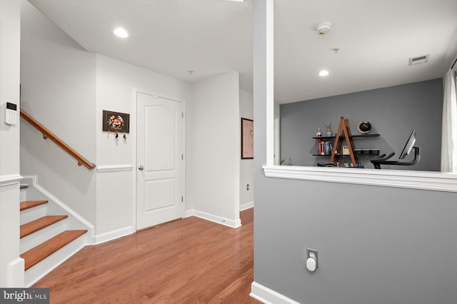 1506 Stack St, Baltimore, MD 21230 - hallway featuring wood finished floors, recessed lighting, and stairs