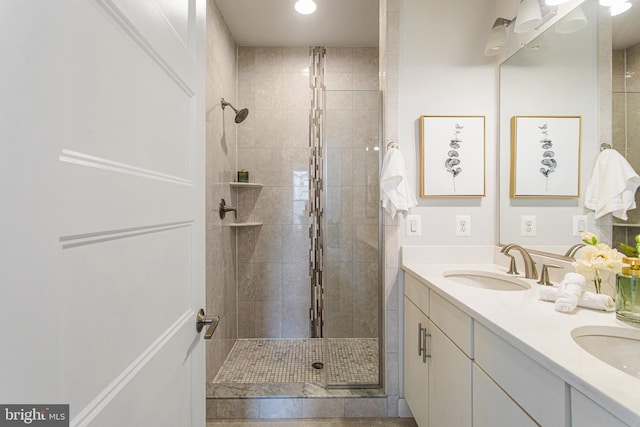 3334 7th St NE, Washington, DC 20017 - full bathroom with double vanity, a shower stall, and recessed lighting