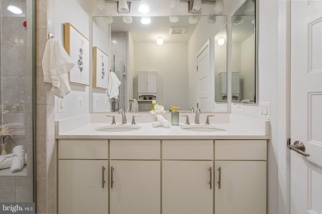 3334 7th St NE, Washington, DC 20017 - bathroom featuring double vanity and tiled shower