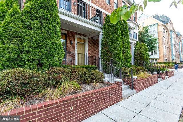 3334 7th St NE, Washington, DC 20017 - doorway to property with brick siding and a residential view