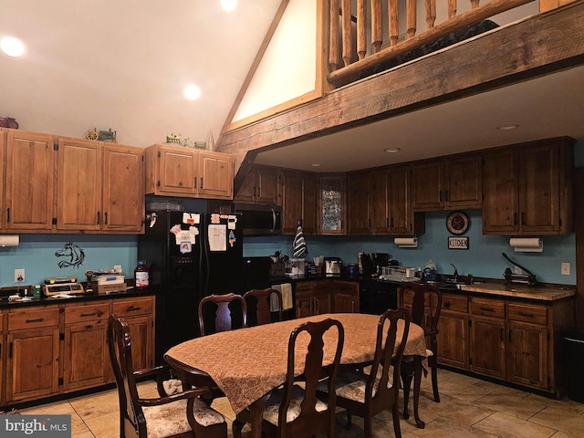 6 Amelia St, Paw Paw, WV 25434 - kitchen featuring black refrigerator with ice dispenser, stainless steel microwave, dark countertops, high vaulted ceiling, and recessed lighting