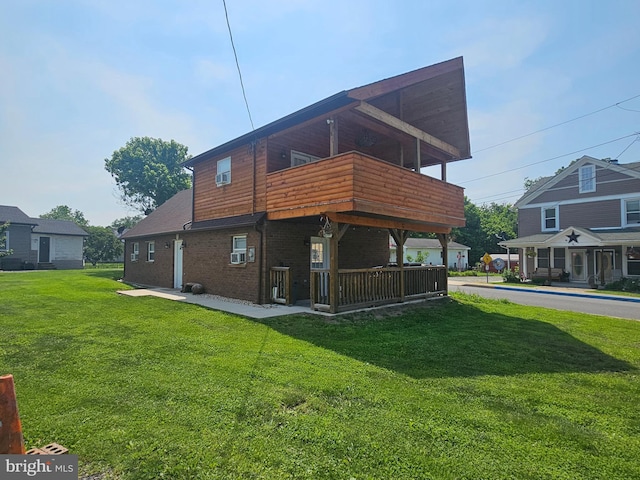 6 Amelia St, Paw Paw, WV 25434 - rear view of house with a lawn and a balcony