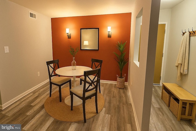 9633 White Acre Rd Unit C2, Columbia, MD 21045 - dining space with wood finished floors and baseboards