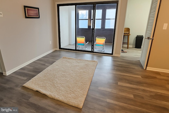 9633 White Acre Rd Unit C2, Columbia, MD 21045 - empty room featuring baseboards and dark wood-style flooring