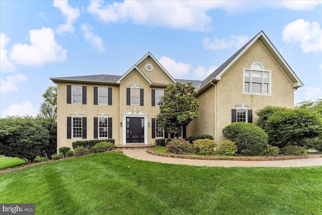926 Kenmara Dr, West Chester, PA 19380 - colonial house with a front lawn and stucco siding