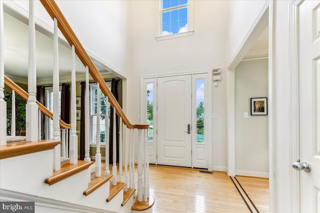 926 Kenmara Dr, West Chester, PA 19380 - entrance foyer featuring light wood-style floors, stairway, and a high ceiling