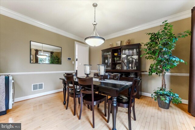 926 Kenmara Dr, West Chester, PA 19380 - dining room featuring light wood-style floors and crown molding