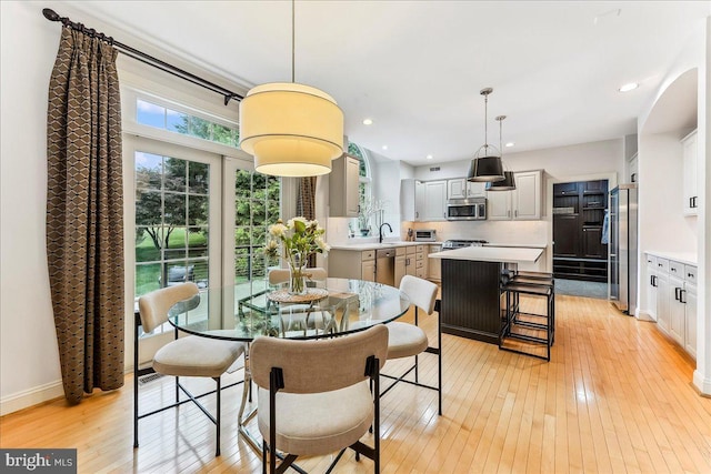 926 Kenmara Dr, West Chester, PA 19380 - dining space with light wood-type flooring and recessed lighting
