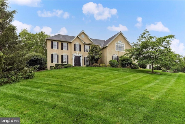 926 Kenmara Dr, West Chester, PA 19380 - colonial home with a front lawn and stucco siding