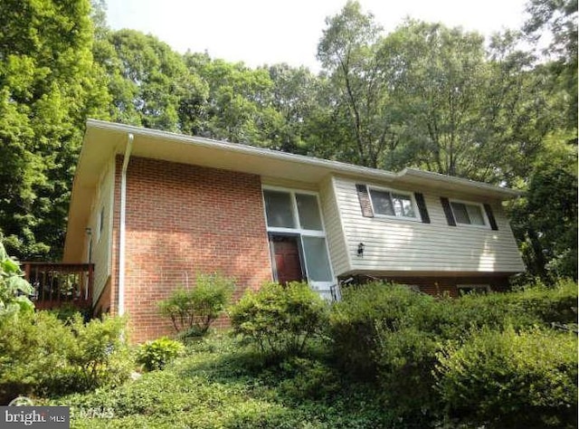 7826 Glenister Dr, Springfield, VA 22152 - view of side of property featuring brick siding