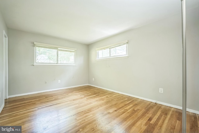 7826 Glenister Dr, Springfield, VA 22152 - empty room with light wood-style floors and baseboards