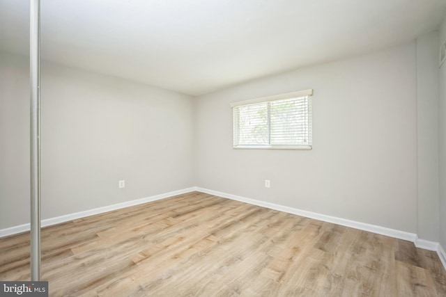 7826 Glenister Dr, Springfield, VA 22152 - empty room featuring baseboards and wood finished floors