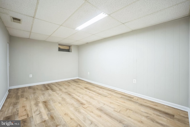 7826 Glenister Dr, Springfield, VA 22152 - empty room with wood finished floors and a paneled ceiling