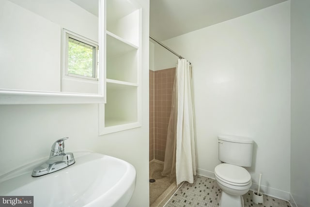 7826 Glenister Dr, Springfield, VA 22152 - bathroom with a sink and a shower stall