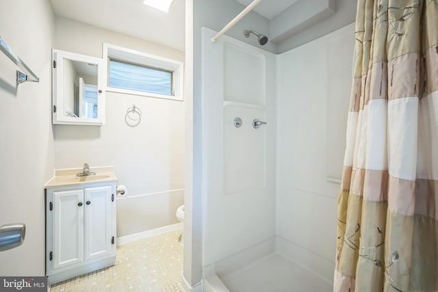 7826 Glenister Dr, Springfield, VA 22152 - bathroom featuring vanity and a shower with shower curtain