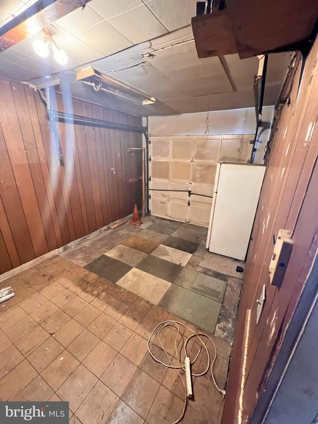 815 S Cypress Ct, Sterling, VA 20164 - garage with freestanding refrigerator and wooden walls