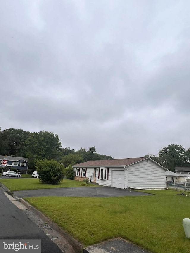815 S Cypress Ct, Sterling, VA 20164 - ranch-style home featuring driveway, a garage, and a front yard