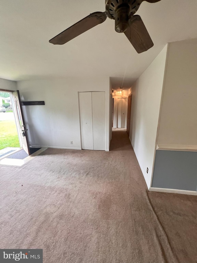 815 S Cypress Ct, Sterling, VA 20164 - unfurnished living room featuring a ceiling fan and carpet floors