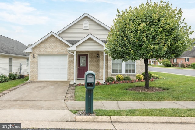 1826 Kershaw Ln, Winchester, VA 22601 - view of front facade with a front lawn, a garage, driveway, brick siding, and covered porch