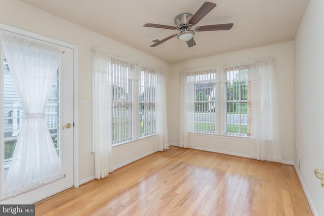 1826 Kershaw Ln, Winchester, VA 22601 - unfurnished room featuring wood finished floors, plenty of natural light, and ceiling fan