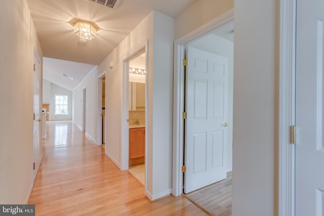 1826 Kershaw Ln, Winchester, VA 22601 - hall with light wood-style floors and lofted ceiling