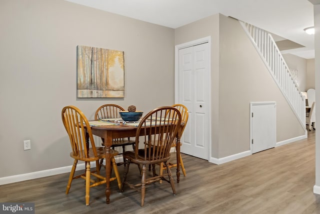 65 Petersburg Ln, Duncannon, PA 17020 - dining space featuring wood finished floors and stairway