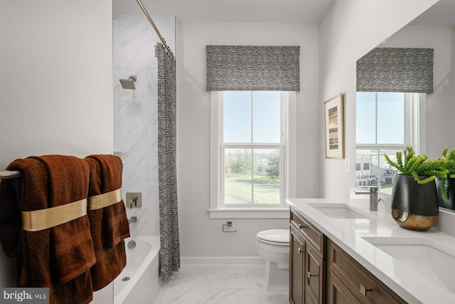 43786 Metro Ter Unit 1026A, Ashburn, VA 20147 - bathroom featuring marble finish floors, double vanity, and shower / tub combo with curtain