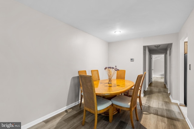 20103 Halethorpe Ln Unit 130, Germantown, MD 20876 - dining space featuring wood finished floors and baseboards