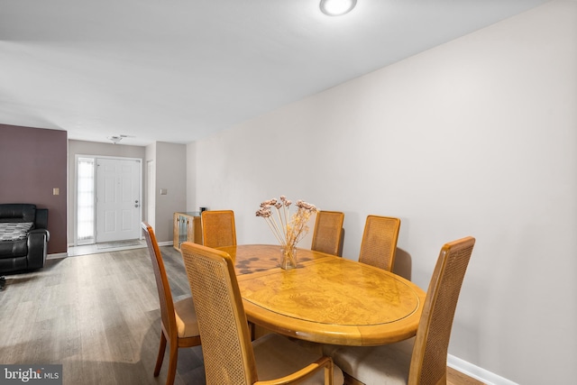20103 Halethorpe Ln Unit 130, Germantown, MD 20876 - dining room featuring wood finished floors and baseboards