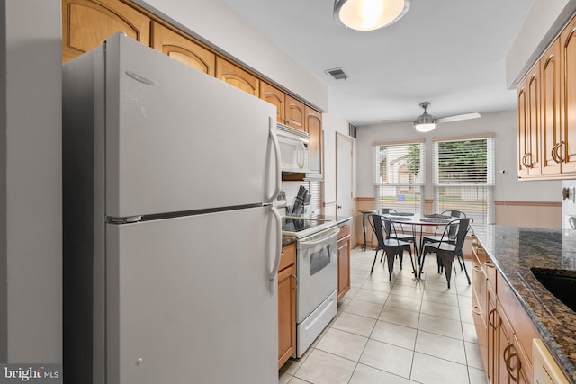 20103 Halethorpe Ln Unit 130, Germantown, MD 20876 - kitchen featuring white appliances, ceiling fan, light tile patterned floors, and dark stone countertops