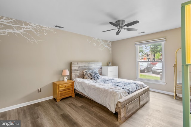 20103 Halethorpe Ln Unit 130, Germantown, MD 20876 - bedroom with light wood-style floors and a ceiling fan