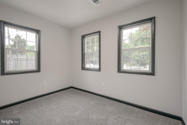 11 Sunset Ln, Bridgeton, NJ 08302 - carpeted empty room featuring baseboards
