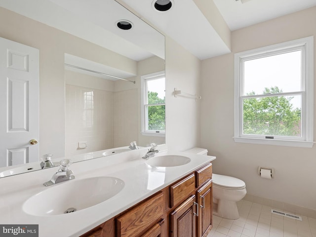 8 Taylors Farm Dr, Newark, DE 19711 - full bathroom with double vanity, tile patterned floors, and a shower
