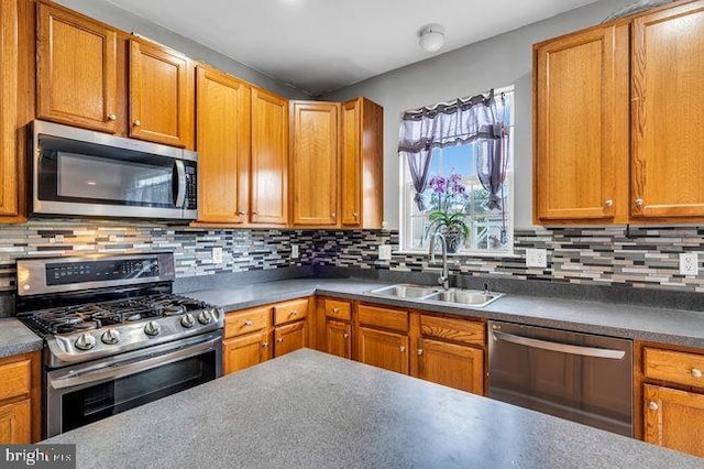 30 Homestead Dr, Pemberton, NJ 08068 - kitchen featuring appliances with stainless steel finishes, decorative backsplash, and brown cabinets