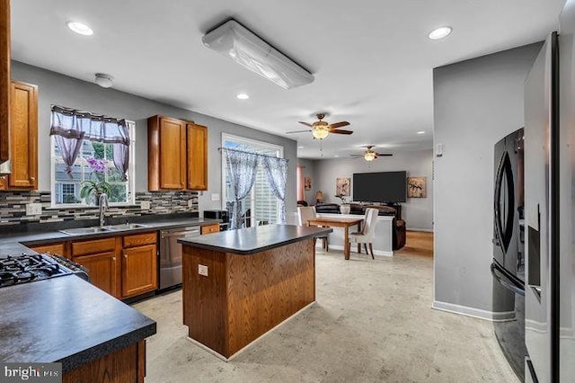 30 Homestead Dr, Pemberton, NJ 08068 - kitchen with dishwasher, dark countertops, a kitchen island, backsplash, and recessed lighting
