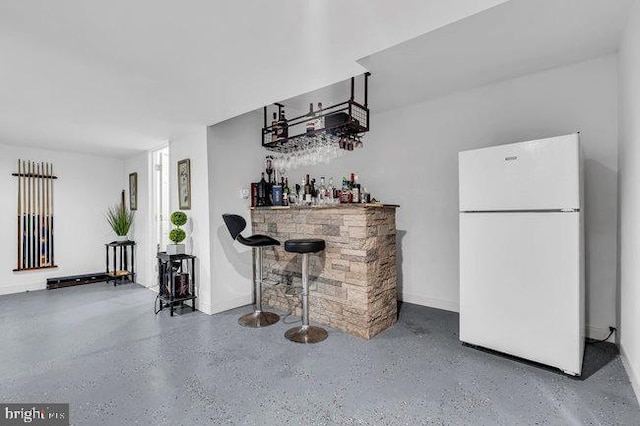 30 Homestead Dr, Pemberton, NJ 08068 - indoor dry bar with freestanding refrigerator and speckled floor