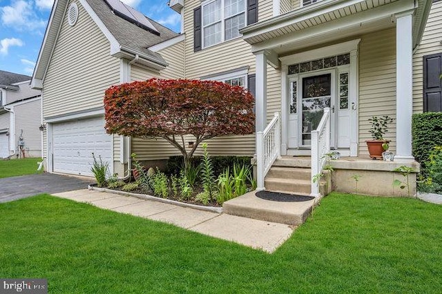 30 Homestead Dr, Pemberton, NJ 08068 - entrance to property with an attached garage, driveway, and a yard