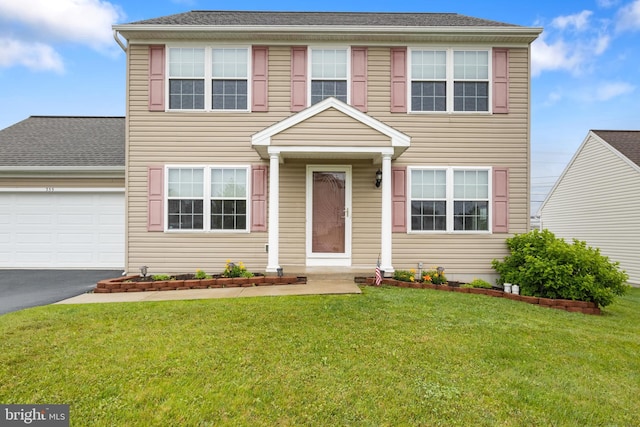 355 Old Stone Way, York, PA 17406 - view of front of house featuring a garage, driveway, and a front lawn