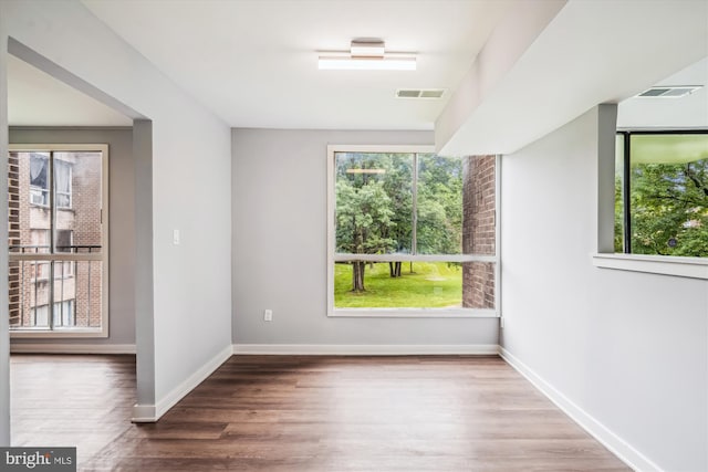7985 Riggs Rd Unit 5, Hyattsville, MD 20783 - spare room with healthy amount of natural light and wood finished floors