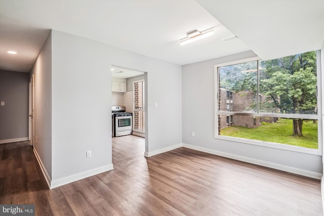 7985 Riggs Rd Unit 5, Hyattsville, MD 20783 - empty room with wood finished floors and recessed lighting